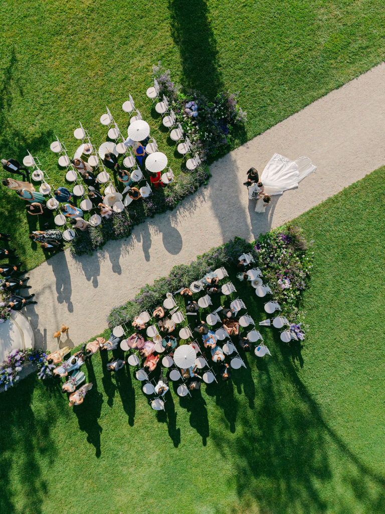 Aerial view of the Château de Tourreau ceremony layout with floral borders designed by Capucine Atelier Floral.