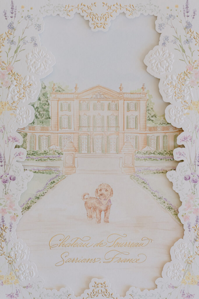 llustrated Château de Tourreau wedding invitation with floral borders, scalloped edges and a portrait of the couple’s dog.