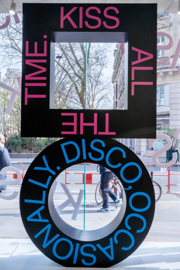 Full Kiss All the Time and Disco Occasionally typographic window installation at the Paris pop-up.